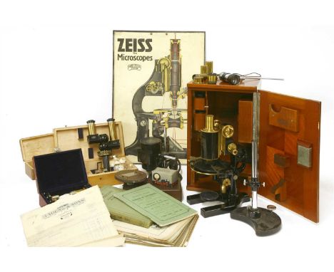 A cased brass and lacquered 'Jena' microscope, first quarter of the 20th century, by Carl Zeiss, no. 81528, 38cm high, presen