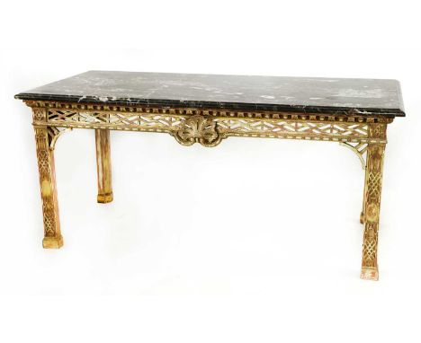 A Chippendale-style giltwood console table, 19th century, the green-veined marble top over an open fret-cut frieze centred by