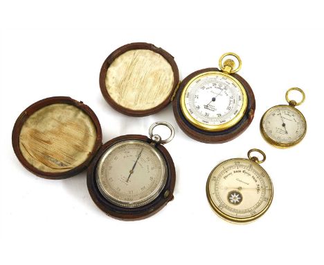 Four pocket barometers, the first with a tiny compass set in the dial, 4.7cm diameter, the second with a silver case, London 