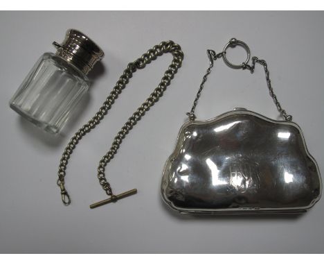 A Hallmarked Silver Purse, of shaped design, initialled, the chain handle with finger ring, a hallmarked silver topped glass 