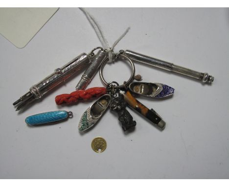 A Miniature Single Blade Folding Knife, with turquoise enamel scales, Persian style slipper charm pendants, flat pencil in a 