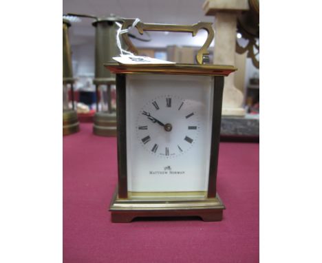 Matthew Norman Brass Cased Carriage Clock, with Swiss movement, black Roman numerals to white dial.
