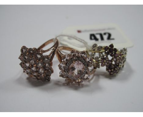 Two Modern 9ct Rose Gold Cluster Dress Rings, each claw set; together with a 9ct gold QVC dress ring, claw set with four flow