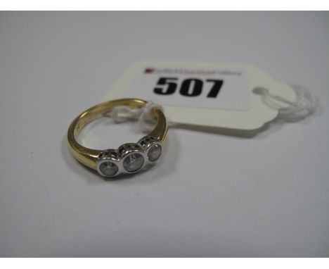 A 18ct Gold Three Stone Diamond Ring, rubover set, stamped ".50".