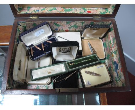 A Pair of 9ct Gold Gent's Cufflinks, each of elongated design, leaf scroll engraved on chain connections, in a case agate cab