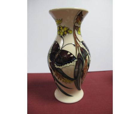 A Moorcroft Pottery Vase, painted in the Butterfly pattern against a cream ground, designed by Emma Bossons, impressed and pa