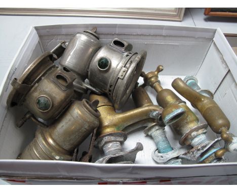 Two Lucas Carbide Lamps, four brass taps having hot/cold porcelain inset to labels.
