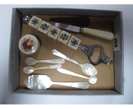 A Royal Worcester Hand Painted Patch Box, circa 1900 featuring fruit, 3.5cm diameter. Mother of Pearl spoons etc:- One Tray