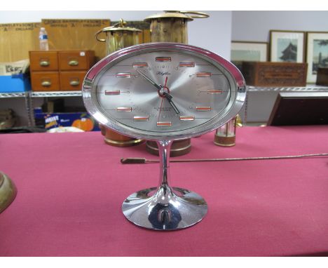 A Circa 1970's Japanese Rhythm Alarm Clock, on chrome effect circular spreading foot, No S1141.