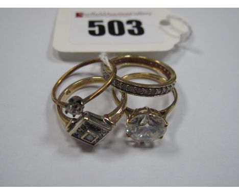 A Modern 9ct Gold Large Single Stone Dress Ring, a 9ct gold diamond set ring, an eternity band and another. (4)