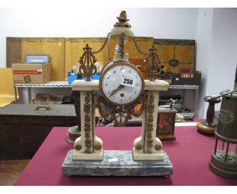 A XIX Century French Gilded Brass Mantel Clock, with a finial top, lyre mounts, enamel dial, (damaged), with swag decoration,