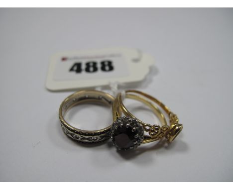 A 9ct Gold Eternity Band; a cluster ring stamped "18ct" and a single stone ring. (3)