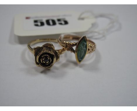 A 9ct Gold Marquise Shape Ring, of cameo style, Birmingham 1905; a 9ct gold flowerhead ring. (2)