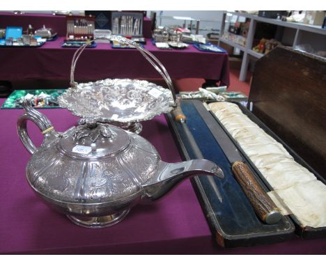 A XIX Century Plated Tea Pot, with engraved decoration. A XIX Century plate on copper basket, with engraved decoration, toget