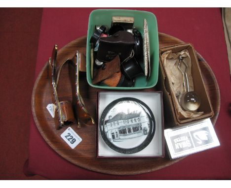 A Pair of XIX Century Brass and Copper Match Holders, in the form of ladies boots, stamped "Lee - Sheffield", magnifying glas