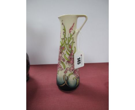 A Moorcroft Pottery Jug, painted in the 'Cornish Heath' pattern, designed by Vicky Lovatt, impressed marks, signed, 18.5cm hi