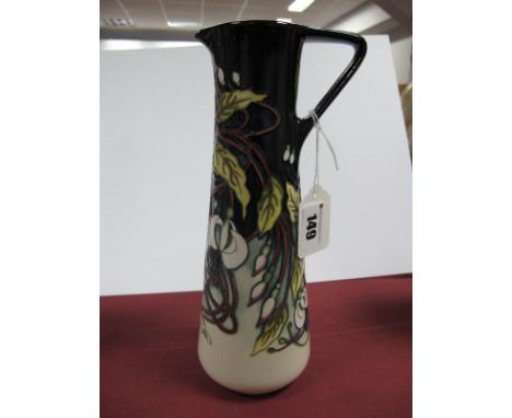 A Moorcroft Pottery Jug Vase, painted with a 'Trial' design of fuschia against a cream and black ground, dated 16.8.12, impre