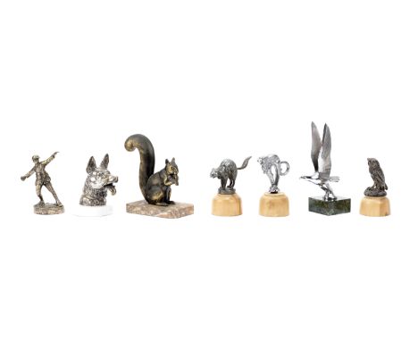 Seven assorted car mascots,including 'The Bomber', British, circa 1915, nickel plated bronze, marked 'Copyright SW Bimingham'