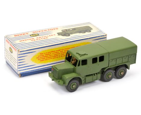 Dinky Military 689 Medium Artillery Tractor, green including Supertoy hubs and tinplate tilt, with figure driver and metal to