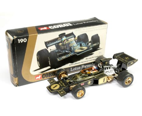 Corgi 190 Lotus Formula 1 racing car (1/18th) scale black and gold with racing No.1 and figure driver Near Mint in a Good Plu