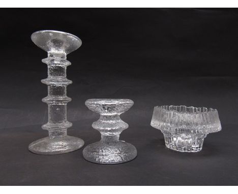 Iittala Festivo candle sticks, four rings, a single ring candle stick and a textured small dish (3)