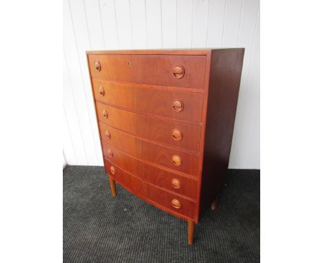 A Kai Kristiansen Danish teak chest of six drawers raised on tapering supports.  80cm x 45cm x 110cm