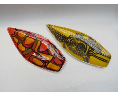 Two Poole Delphis spear shaped dishes by Margaret Anderson and Angela Wyburgh, shape 82, 43.5cm long