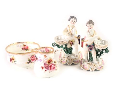 Four items of ceramics, comprising two continental porcelain figures, of children carrying baskets, with gilt and floral deco