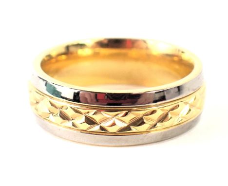 A Titanium wedding band, with patinated central band, stamped 18k titanium, 4.2g all in. 