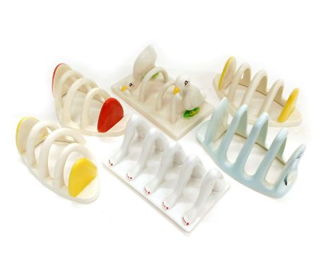 A quantity of Carltonware novelty and other toast racks, to include models with geese, walking ware, and three similar in sha