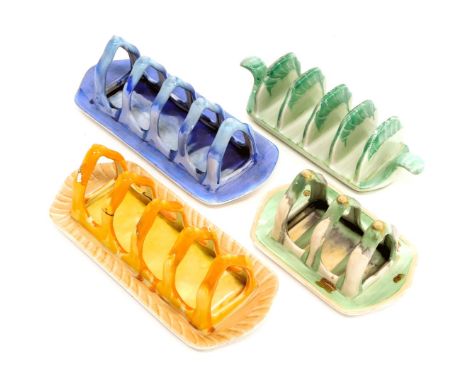 Four Shelley Art Deco ceramic toast racks, in shades of blue, orange and green. 