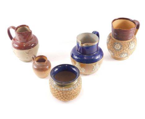 Three items of Doulton Lambeth stoneware, comprising relief moulded and blue glazed jug, 16cm high, gilt patterned bowl, 10cm