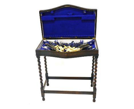 A part canteen of old English silver plated cutlery, to include knives, forks, spoons, etc., one tier the oak canteen stamped