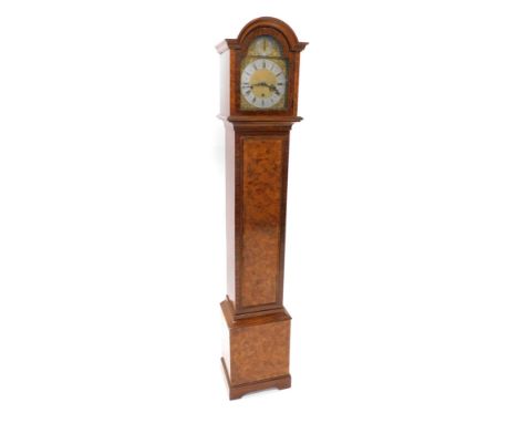 A grandmother clock with Westminster, Winchester and Wittington chimes, in a faux walnut case, 167cm high. 