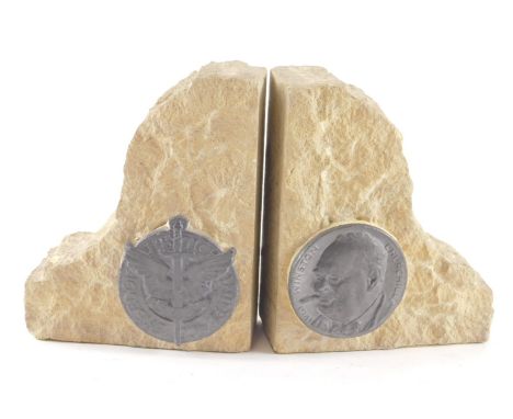 A pair of carved stone book ends, each applied with plaque for Freedom Justice and Peace, another Winston Churchill 1941, in 
