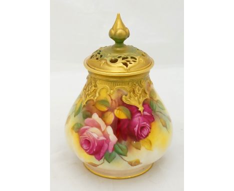 A Royal Worcester pot pourri vase of fluted sack shape with gilt lappet and leaf moulded collar, the body painted with red ro