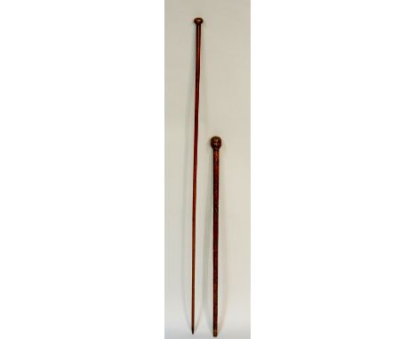 A 19th Century mahogany dip rule, to measure inches and imperial gallons, plain turned pommel, 132cm high; a walking stick wi