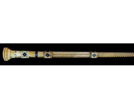 A fine late 18th / early 19th Century whalebone stem walking stick of spirally fluted form with fluted and cube upper section