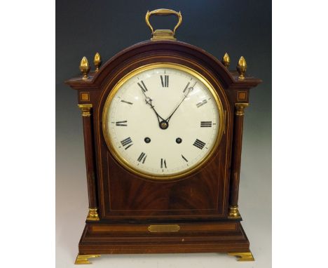An Edwardian mahogany mantel clock in George III style the case inlaid overall with boxwood and ebony stringing, the domed to