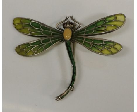 Meyle & Mayer - a plique-á-jour dragonfly brooch with opal body and red gem set eyes, green and black enamelled body and tran