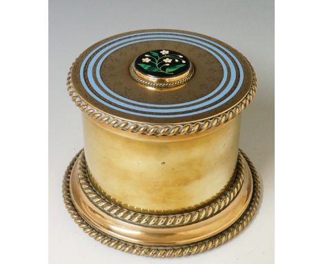A good Victorian brass tobacco jar of cylindrical design with cable moulded borders the pull off top finely engraved with tri