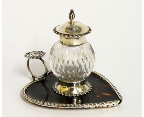 A late Victorian silver and tortoiseshell inkwell the heart shaped base with silver gadrooned rims, pierced thumb piece, the 