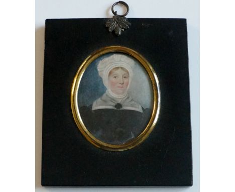 English School, early 19th Century - half length portrait of a middle aged woman wearing pearl necklace, waisted black dress 