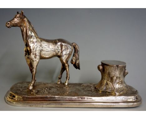 A desk inkwell the rounded rectangular rustic base with 'tree stump' well flanked by a horse, 20cm wide, 13cm high, marked, l