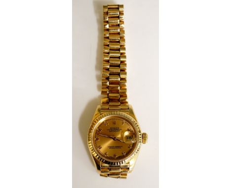 Rolex - a ladies 18ct gold Oyster Perpetual Datejust, with fluted bezel, screwcase back, screw down Rolex winding crown and b