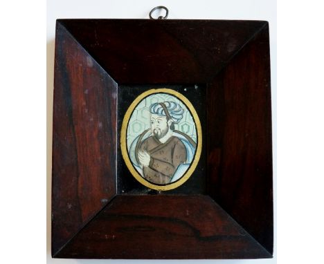 Indian School, 19th Century - half length portrait of a man with turban, brown garments and blue cloak, watercolour on silk, 