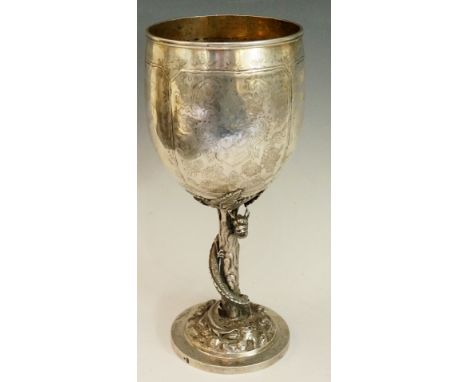 A fine Chinese large silver goblet, the urnular shaped cup panelled with simulated bamboo branches and bearing a crest, drago