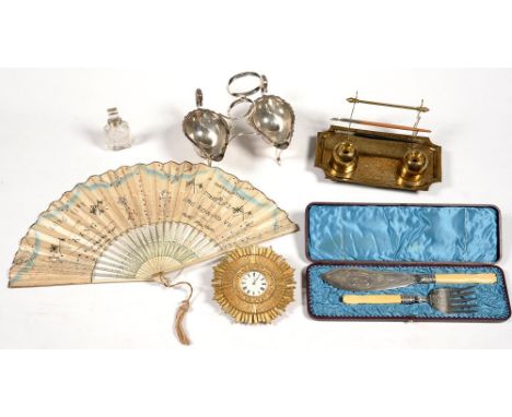 A VICTORIAN BRASS INKSTAND WITH PEN RACK, DECORATED WITH ARABESQUES, 24CM L, A CASED PAIR OF EDWARDIAN EPNS FISH SERVERS, AN 