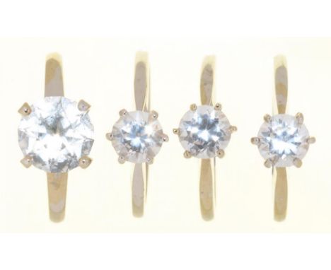 FOUR STONE SET RINGS IN WHITE GOLD, MARKED 14K, 10G, SIZES K - L++IN GOOD CONDITION WITH LIGHT WEAR CONSISTENT WITH AGE 