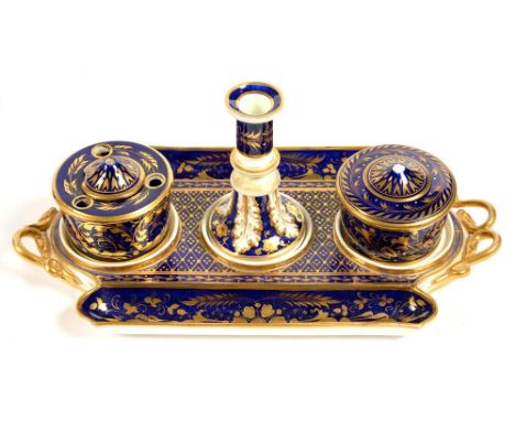 A DERBY INKSTAND, THE OBLONG TRAY WITH DETACHABLE TAPERSTICK, INKWELL / QUILL HOLDER AND COVER AND CYLINDRICAL BOX AND COVER,